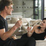 couple laughing drinking champagne