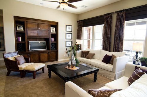 Model Home, Dark Living Room, White Couch, Ceiling Fan