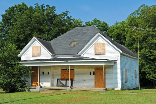 boarded up house