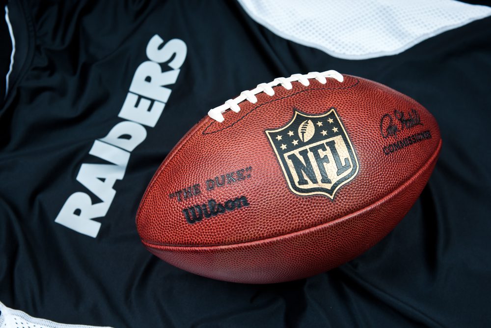 Football Jersey and Football depicting the Raiders Football Team