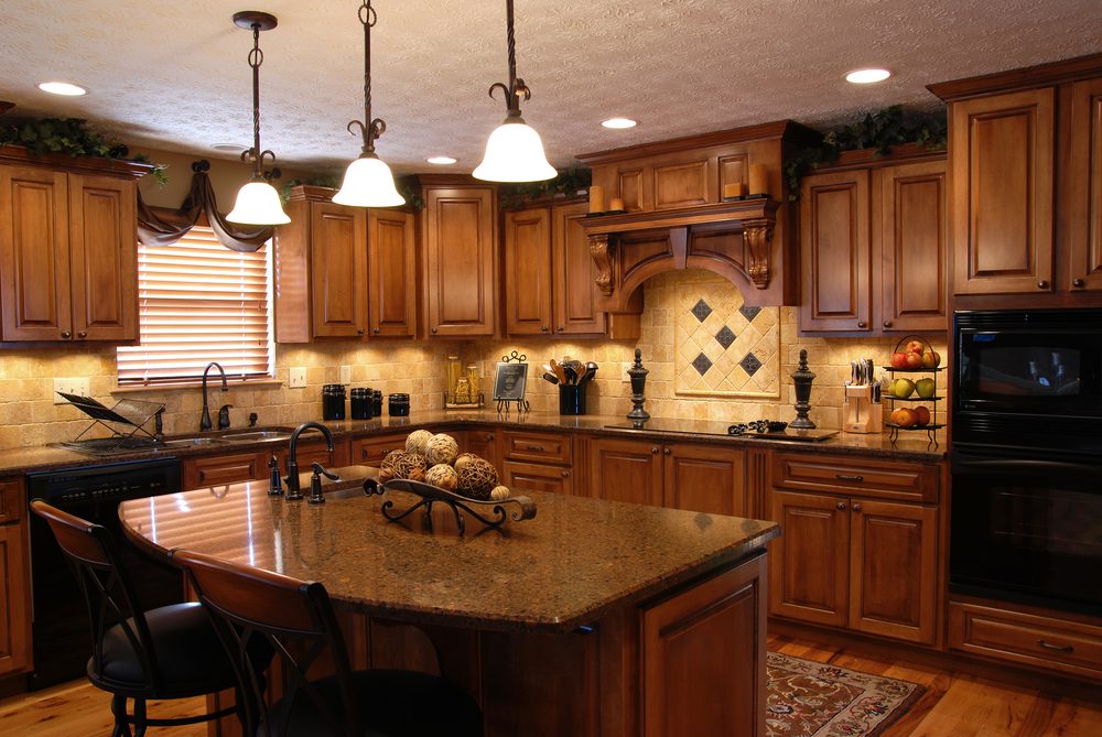 Beautiful Dark Kitchen, 3 lights, island, in a custom home in Las Vegas