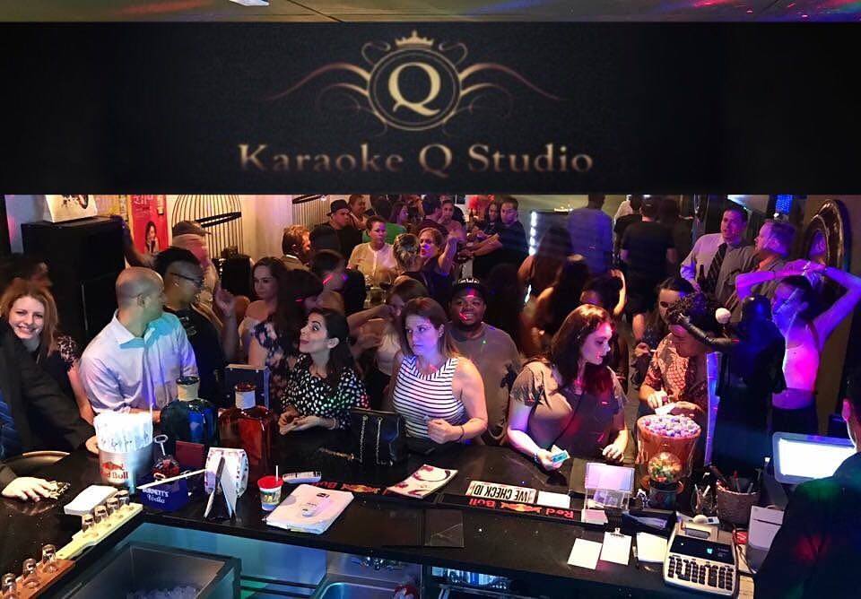 Picture of a group of people in a small bar at Karaoke Q Studio for Karaoke in Las Vegas