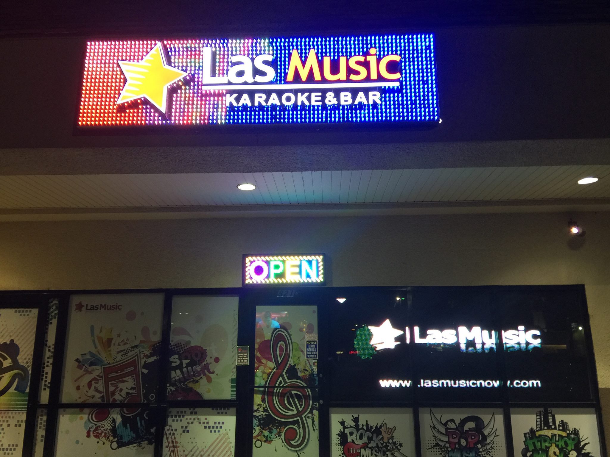 Entrance and sign to Las Music Karaoke Bar