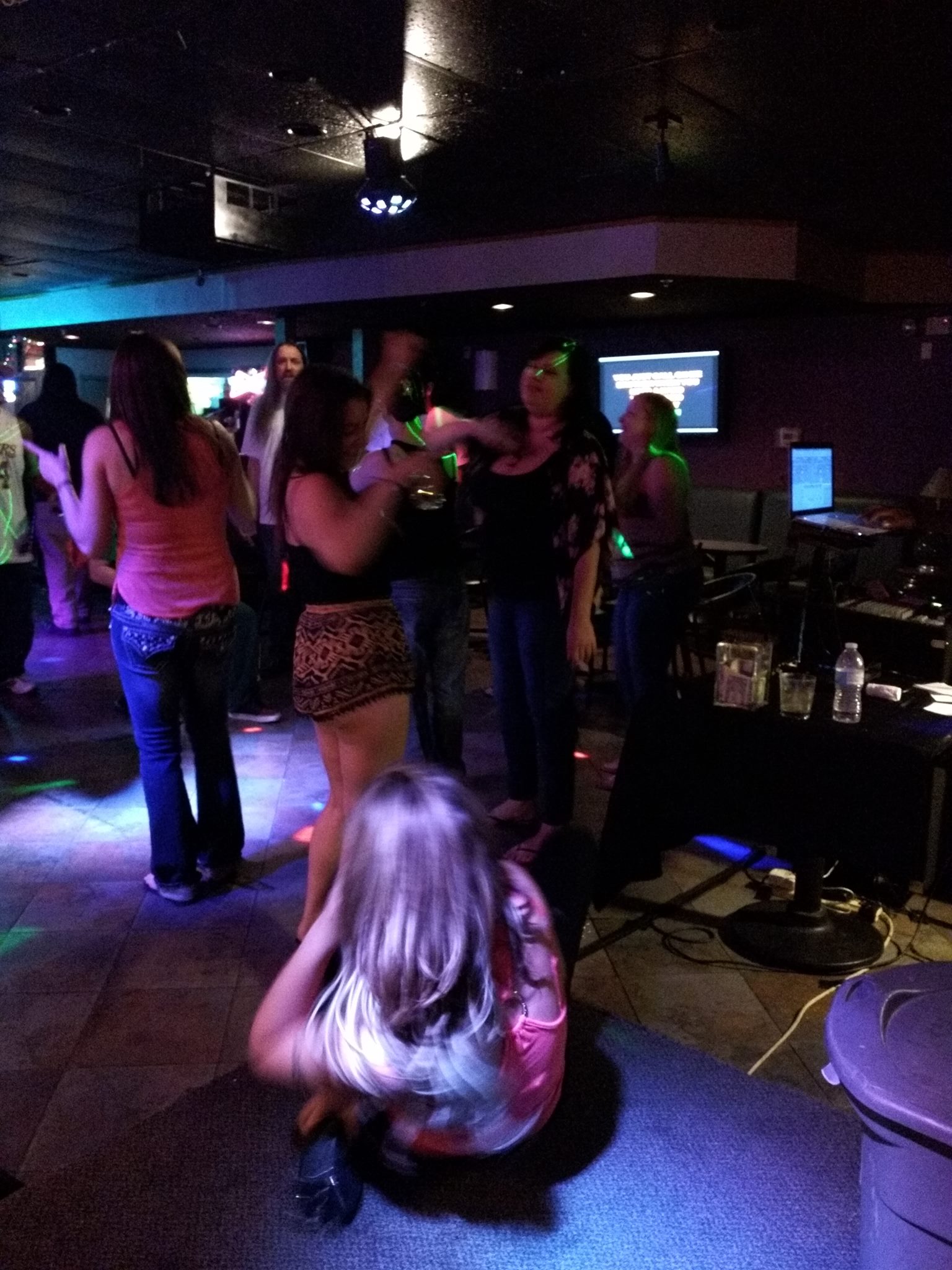 People are on the dance floor during a karaoke las vegas event at Pandoras Karaoke Bar