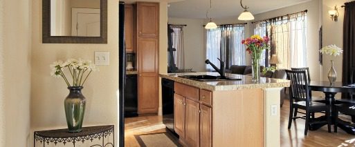 example of Las Vegas condo kitchen and dining room in tan