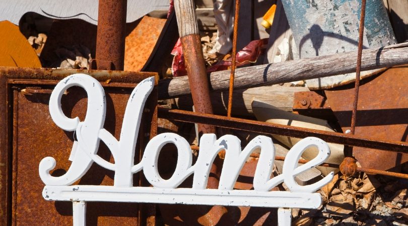 The word home looks like it's in an old sign yard maybe